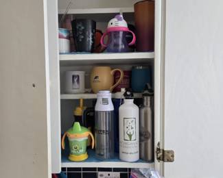 Assorted Travel Mugs; Kitchen Supplies and more.
