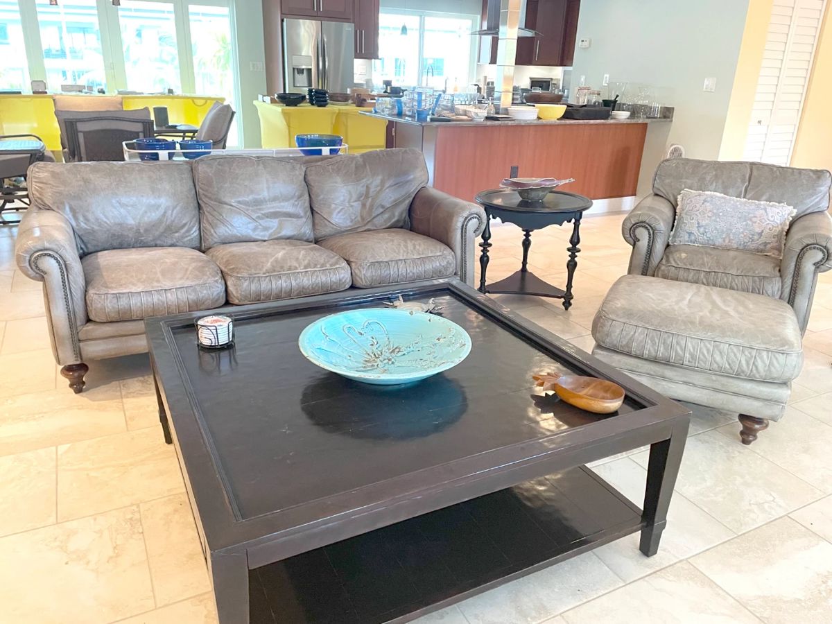 Robb & Stuckey couch, chair & ottoman in pale gray with down-filled cushions. Chef's kiss!