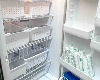 Upright White Frigidaire Freezer (32"W x 28.5"D x 70"H) with lots of functional shelves and baskets. Ice packs too!