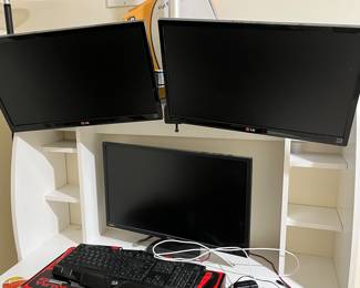 Multiple monitors for sale! The two upper monitors are connected to one attachment that can be mounted anywhere!