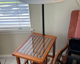 I believe this is rosewood! Beautiful side table with lamp attached. Very clean and in perfect condition!
