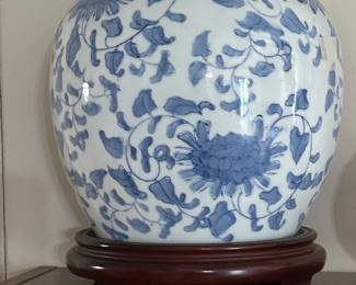 Very nice temple jar with lid on wood base