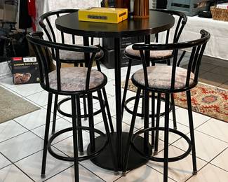 Great black pub table with 6 black swivel bar stools (4 pictured) to make a comfortable setting for any room in the house!!