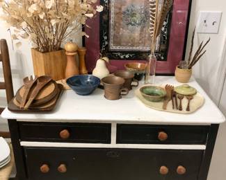Black and white storage dresser, pottery, and more
