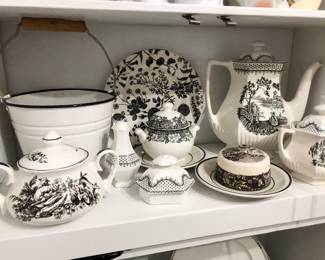 Black and white chinoiserie teapots and dishes