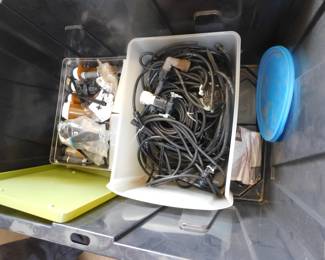 Container filled with drip irrigation parts