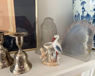 Vintage lusterware red-beaked crane pin cushion, glass bookends, and bell candle holders