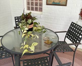 Round glass-top patio table with 4 metal side chairs - All season