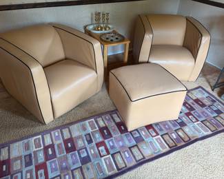Leather club lounge chairs and ottoman. Chairs are peach leather with black trim - very good condition; area rug (runner) wool geometric pattern