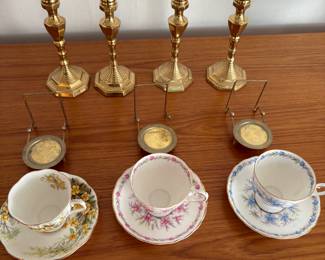 Brass candle holders (set of 4) and china cups/saucers with display stands