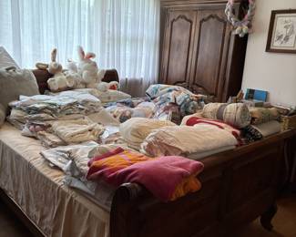 Linens, sleigh bed, armoire, nightstand