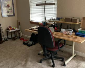 Office desk and chair, Office supplies, Desk Lamp, Golf clubs, Weights