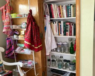 Cookbooks, glass jars, tins, aprons