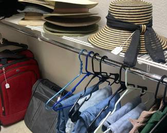 Men's dress hats and a woman's hat
