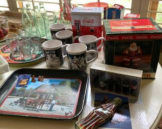 Coco Cola Collection...incredible...mugs, glasses, bottles, trays, Santa stocking holder, etc.