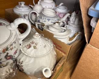 Tea Cups, Saucers and Teapots