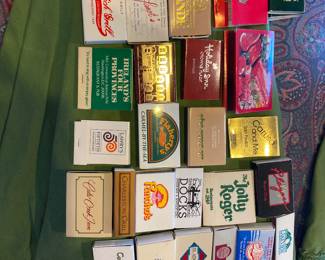 Dozens of matchbooks and matchboxes unstruck