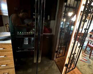 Kenmore side by side refrigerator. Great condition. Ice and water in the door.