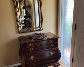 Very nice solid entry table. One side has sun damage. Great project piece. And mirror