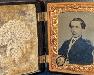 Dennis Wilcox with tintype of his wife tucked in corner.