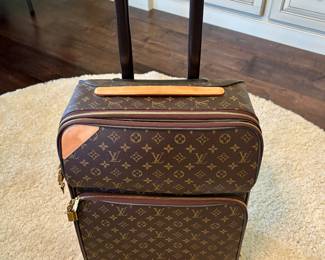 Louis Vuitton carry on complete with carr on 