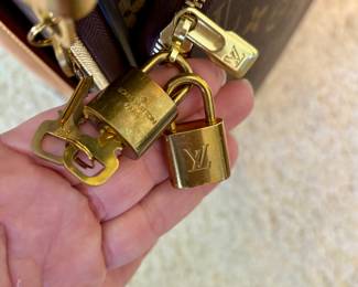 Louis Vuitton hardware and luggage locks with keys
