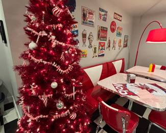 Holiday tree all decorated with the red and white theme..  Bright and cheery!