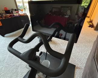 Here's some information about the Peloton Bike:
Features:
It includes a touchscreen display (21.5 inches on the original Bike, 23.8 inches on the Bike+) for streaming classes, tracking metrics like heart rate, output, cadence, and resistance, and offers various connectivity options (Wi-Fi, Bluetooth, USB). 
Subscription:
A Peloton All-Access Membership is required to access the full range of content, including live and on-demand classes for cycling, strength, yoga, and more. 
Usage without subscription:
While the Bike can be used without a subscription in "Just Ride" mode, access to classes and advanced features is limited. 
Cost:
The original Peloton Bike typically costs around $1,445, and the All-Access Membership is a separate monthly fee. 
Benefits:
Peloton aims to replicate the in-person exercise class experience at home, offering a wide variety of classes and instructors to suit different fitness goals. 