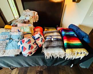 Quilts, throws and colorful Mexican  blankets