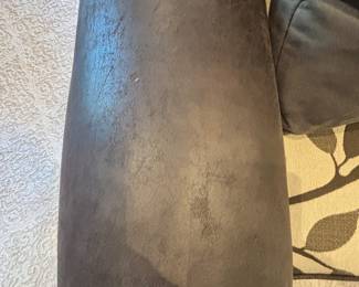 Arm of curved sofa
