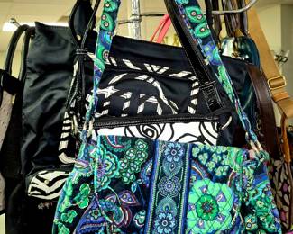 Much ladies purses, wallets and travel accessories. Vera Bradley, Dooney and Burke, Lug and London Fog