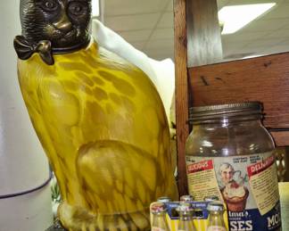 Glass figurines and lights.  Frosted amber Tin Chi cat night light