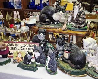 Large selection of cast iron vintage and modern door stops