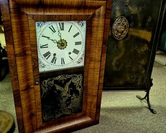Clocks. Antique reversed painted eagle on glass wall clock w/ key