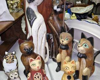 Carved cat figurines
