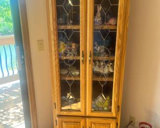 Small lighted curio cabinet