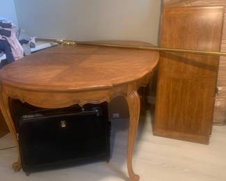 Solid oak dining table with two leaves