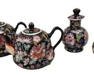 CHINESE BLACK GROUND SMALL TEAPOTS AND CRUETS WITH THREADED LIDS
