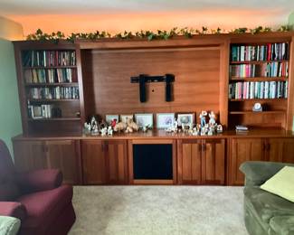 Books on shelving and figurines on built-in (sold with house).