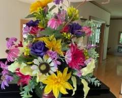 Beautiful Floral Arrangement Atop Piano