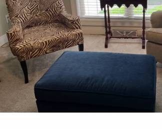 This animal print chair in cream and cinnamon is so stylish and in wonderful condition...would look great in any room and compliment any decor. The floor lamp behind it is also for Sale!