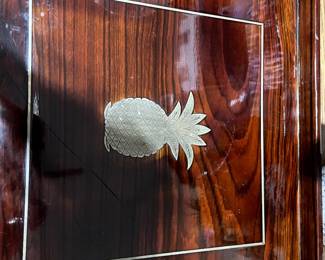 The pineapple signifies hospitality and Southern charm! Beautiful wooden serving tray, lovely addition to your bar or kitchen.