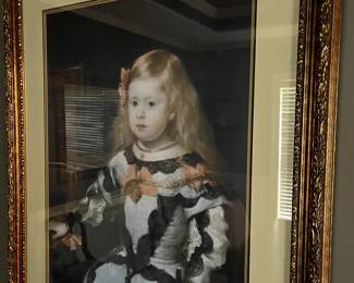 Portrait of Infanta Margarita Teresa, by Italian artist Diego Valazquez, during the Spanish Golden Age. She was the daughter of King Philip IV. The portrait is beautifully framed in a Baroque gold gilded style.