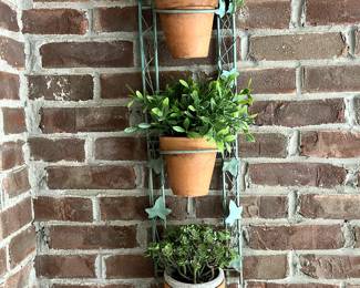 Really nice Verde metal triple planter with faux plants