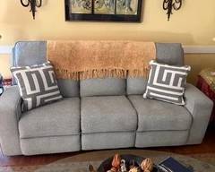 Ashley Furniture couch w/recliners at each end electronic w/pillows