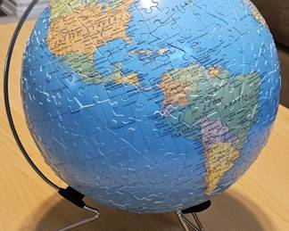 World Globe Puzzle w/ Blue Background