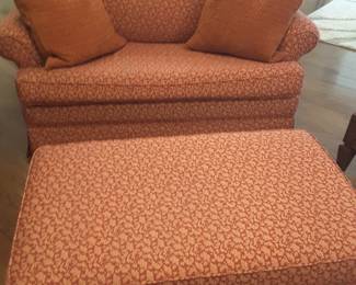 Loveseat sleeper, lets out into a twin bed. Pair of matching ottomans open for storage.