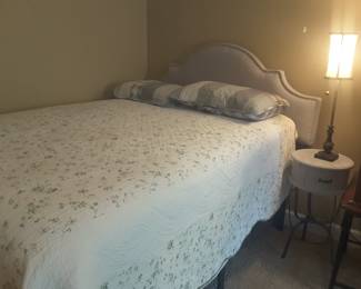 Full size mattress set with queen size headboard