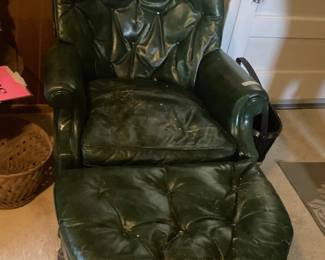Dark green leather chair with ottoman