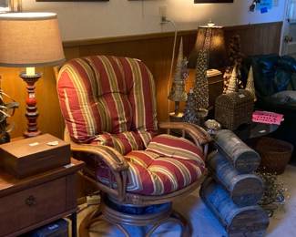 Rattan chair swivels and rocks